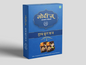 A blue rectangular box of Drt Fruit Fudge with premium gold and white Hindi-English text, decorative designs, chikki images at the bottom front, and a small green square in the corner. The pack size is 500 grams.